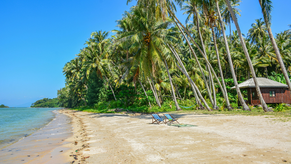 On a beach in northern Thailand, a beauty model is working on a new photo shoot.